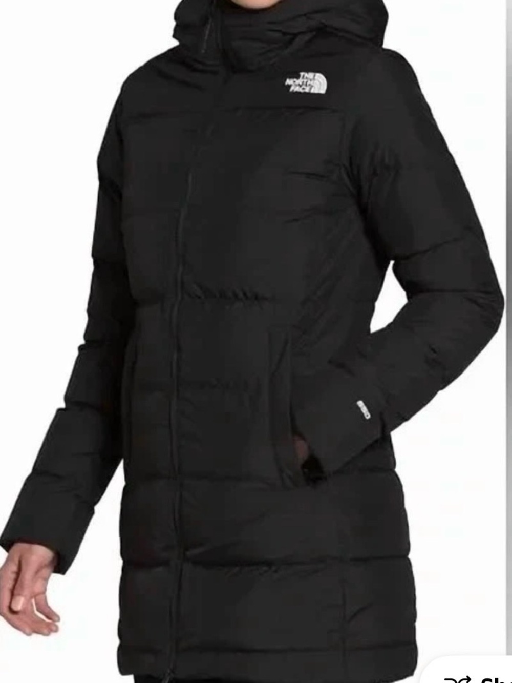 The North Face Women's Black Long Puffer Jacket 550 down filled.